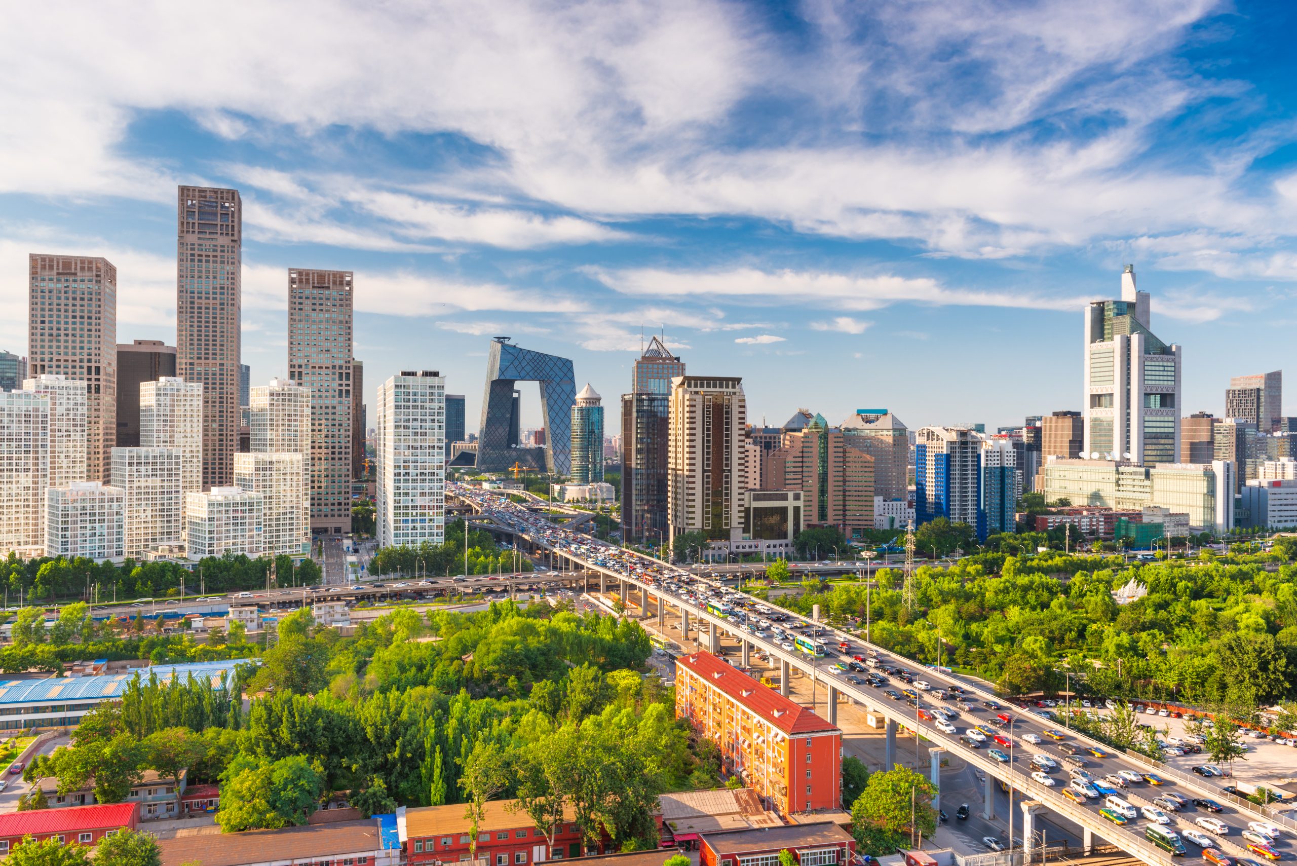 Beijing, China modern financial district skyline on a nice day with blue sky.