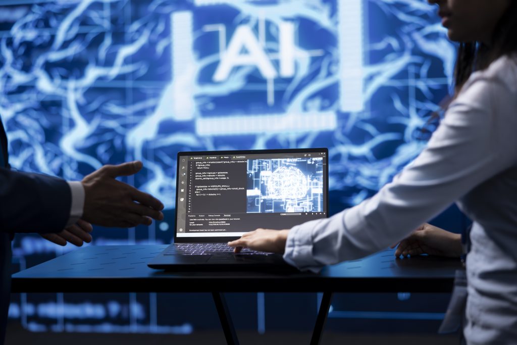 A graphic featuring the word AI in tech evnironment